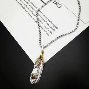 Goros Style Elegant Silver and Gold Feather Pendant Necklace